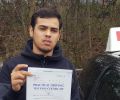 Jay with Driving test pass certificate